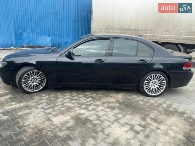 Черный БМВ 7 Серия, объемом двигателя 3 л и пробегом 254 тыс. км за 7500 $, фото 1 на Automoto.ua