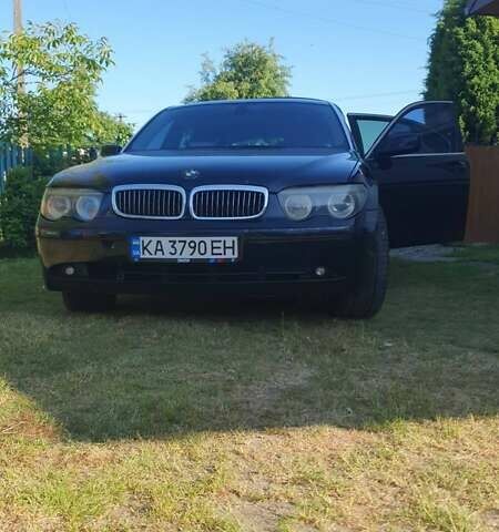 Черный БМВ 7 Серия, объемом двигателя 4.4 л и пробегом 250 тыс. км за 5500 $, фото 1 на Automoto.ua