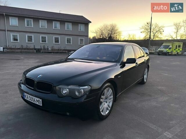 Чорний БМВ 7 Серія, об'ємом двигуна 3 л та пробігом 477 тис. км за 4950 $, фото 1 на Automoto.ua
