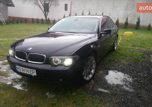 Черный БМВ 7 Серия, объемом двигателя 3 л и пробегом 299 тыс. км за 8000 $, фото 1 на Automoto.ua