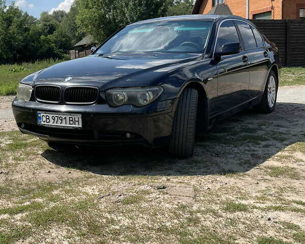 Чорний БМВ 7 Серія, об'ємом двигуна 2.98 л та пробігом 295 тис. км за 5600 $, фото 1 на Automoto.ua