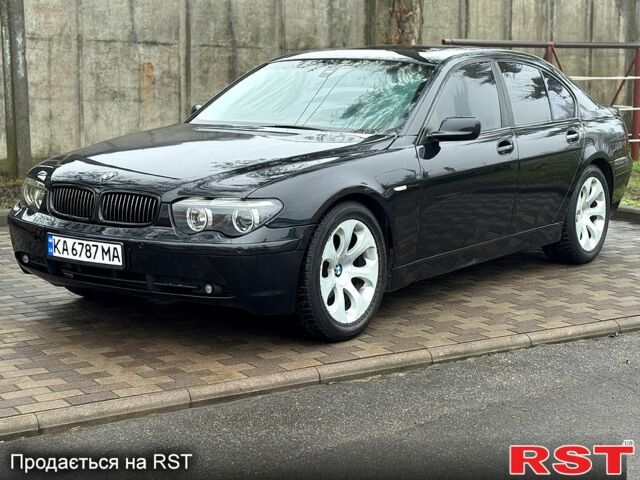 Чорний БМВ 7 Серія, об'ємом двигуна 3 л та пробігом 280 тис. км за 6999 $, фото 1 на Automoto.ua