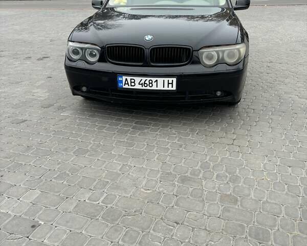 Черный БМВ 7 Серия, объемом двигателя 4.4 л и пробегом 265 тыс. км за 7800 $, фото 1 на Automoto.ua