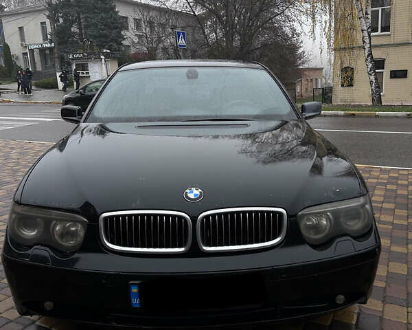 Черный БМВ 7 Серия, объемом двигателя 3 л и пробегом 630 тыс. км за 6500 $, фото 1 на Automoto.ua