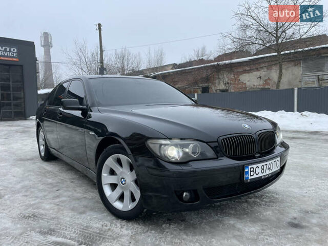 Черный БМВ 7 Серия, объемом двигателя 4 л и пробегом 302 тыс. км за 8500 $, фото 1 на Automoto.ua