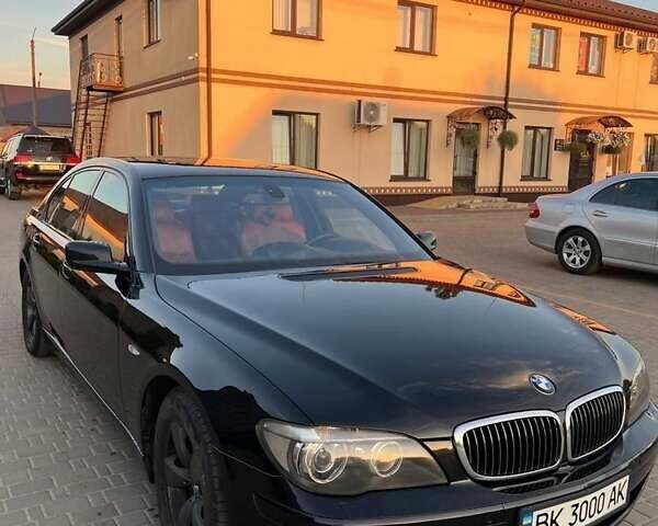 Черный БМВ 7 Серия, объемом двигателя 4.8 л и пробегом 310 тыс. км за 11550 $, фото 1 на Automoto.ua