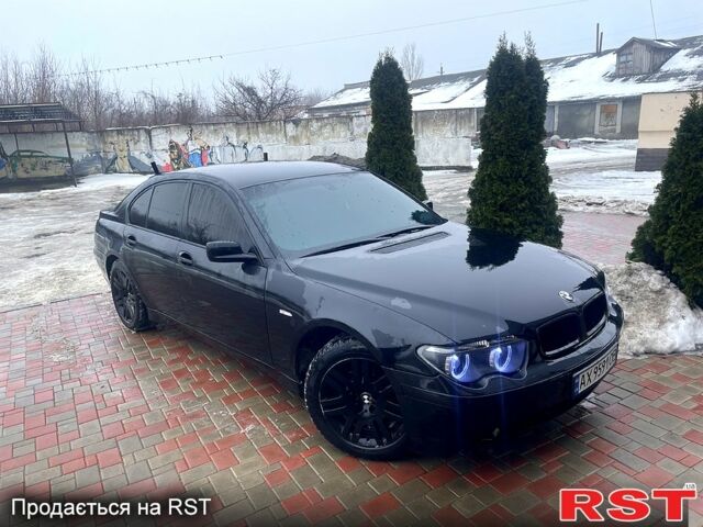 Черный БМВ 7 Серия, объемом двигателя 3 л и пробегом 111 тыс. км за 8500 $, фото 1 на Automoto.ua