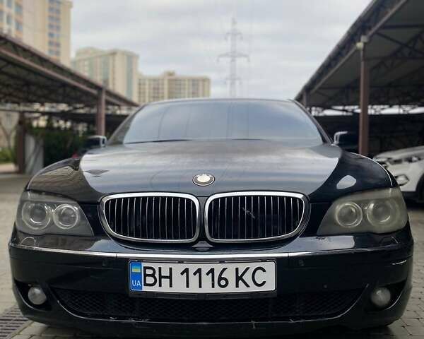 Черный БМВ 7 Серия, объемом двигателя 2.99 л и пробегом 430 тыс. км за 6500 $, фото 1 на Automoto.ua