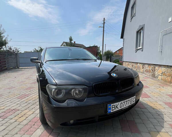 Черный БМВ 7 Серия, объемом двигателя 3 л и пробегом 387 тыс. км за 8500 $, фото 1 на Automoto.ua