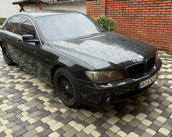 Черный БМВ 7 Серия, объемом двигателя 2.98 л и пробегом 245 тыс. км за 8000 $, фото 1 на Automoto.ua