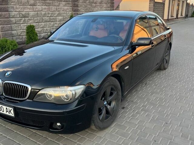 Черный БМВ 7 Серия, объемом двигателя 4.8 л и пробегом 310 тыс. км за 11550 $, фото 1 на Automoto.ua