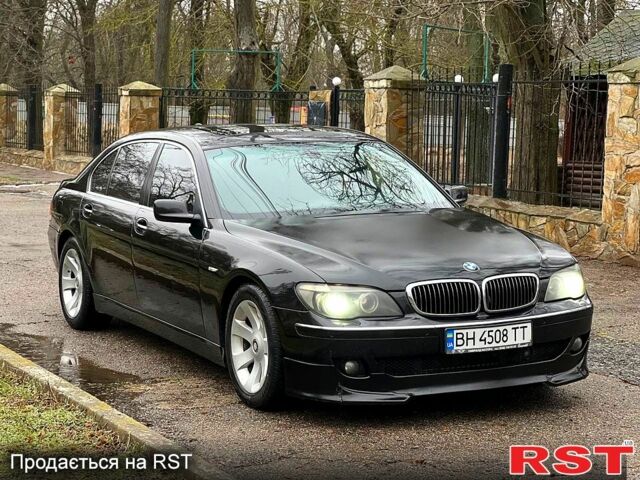 Черный БМВ 7 Серия, объемом двигателя 4.8 л и пробегом 21500 тыс. км за 5999 $, фото 1 на Automoto.ua