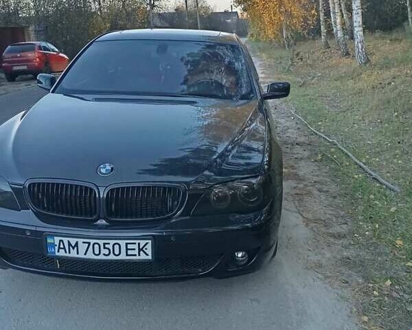 Черный БМВ 7 Серия, объемом двигателя 4.8 л и пробегом 331 тыс. км за 10500 $, фото 1 на Automoto.ua