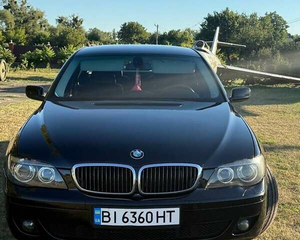 Чорний БМВ 7 Серія, об'ємом двигуна 4 л та пробігом 211 тис. км за 8500 $, фото 1 на Automoto.ua