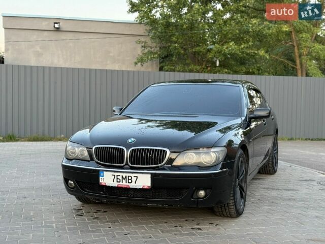 Черный БМВ 7 Серия, объемом двигателя 2.99 л и пробегом 319 тыс. км за 9500 $, фото 1 на Automoto.ua