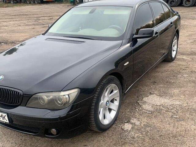 Чорний БМВ 7 Серія, об'ємом двигуна 3.98 л та пробігом 300 тис. км за 7800 $, фото 1 на Automoto.ua