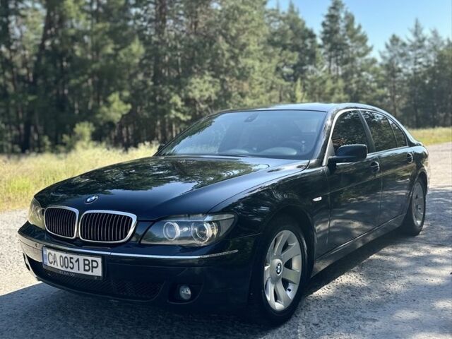 Чорний БМВ 7 Серія, об'ємом двигуна 4 л та пробігом 298 тис. км за 7492 $, фото 1 на Automoto.ua