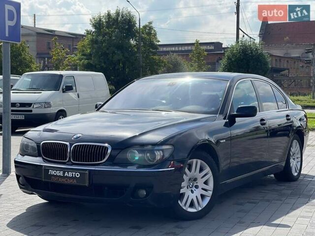 Черный БМВ 7 Серия, объемом двигателя 4.5 л и пробегом 215 тыс. км за 16000 $, фото 1 на Automoto.ua