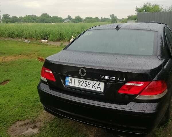 Черный БМВ 7 Серия, объемом двигателя 4.8 л и пробегом 201 тыс. км за 2344 $, фото 1 на Automoto.ua