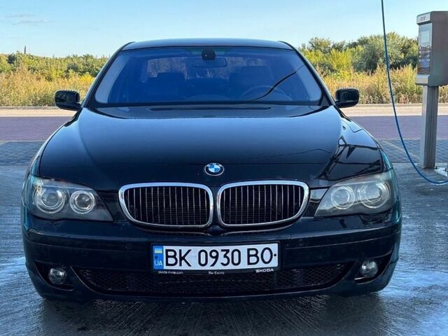Черный БМВ 7 Серия, объемом двигателя 4 л и пробегом 256 тыс. км за 7500 $, фото 1 на Automoto.ua