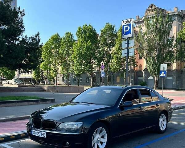 Черный БМВ 7 Серия, объемом двигателя 3 л и пробегом 360 тыс. км за 10500 $, фото 1 на Automoto.ua