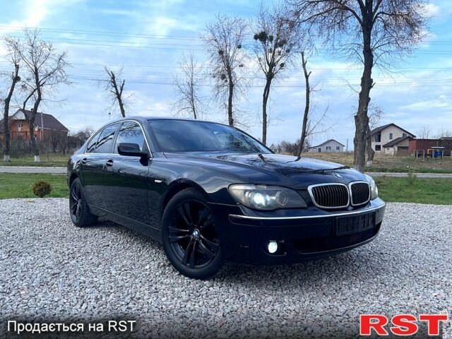 Черный БМВ 7 Серия, объемом двигателя 3 л и пробегом 307 тыс. км за 11000 $, фото 1 на Automoto.ua