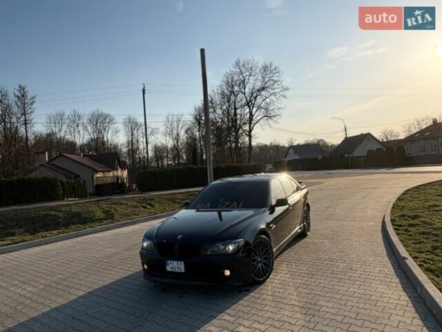 Чорний БМВ 7 Серія, об'ємом двигуна 4 л та пробігом 300 тис. км за 9499 $, фото 1 на Automoto.ua