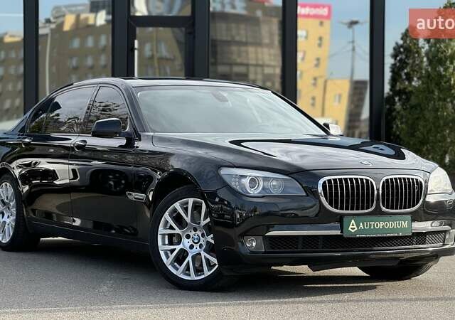 Чорний БМВ 7 Серія, об'ємом двигуна 4.4 л та пробігом 141 тис. км за 13500 $, фото 1 на Automoto.ua