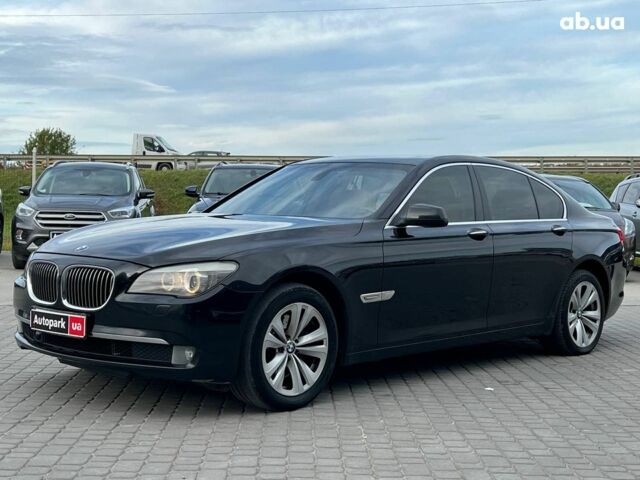 Черный БМВ 7 Серия, объемом двигателя 3 л и пробегом 298 тыс. км за 14290 $, фото 1 на Automoto.ua