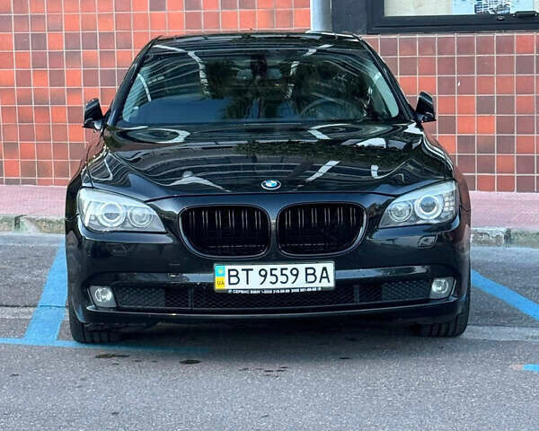 Черный БМВ 7 Серия, объемом двигателя 4.39 л и пробегом 217 тыс. км за 12957 $, фото 1 на Automoto.ua