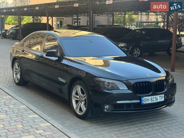 Черный БМВ 7 Серия, объемом двигателя 2.98 л и пробегом 285 тыс. км за 12400 $, фото 1 на Automoto.ua