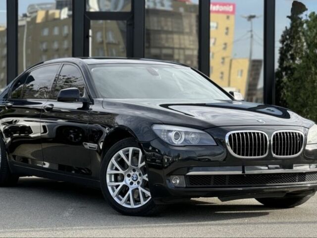 Черный БМВ 7 Серия, объемом двигателя 4.4 л и пробегом 141 тыс. км за 12500 $, фото 1 на Automoto.ua