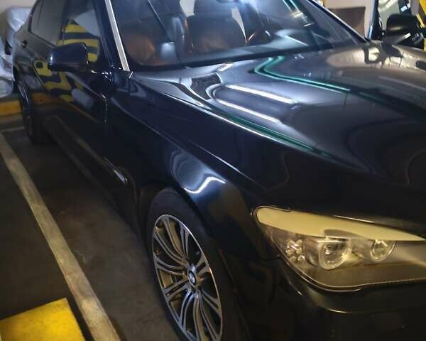 Черный БМВ 7 Серия, объемом двигателя 4.4 л и пробегом 276 тыс. км за 9300 $, фото 1 на Automoto.ua