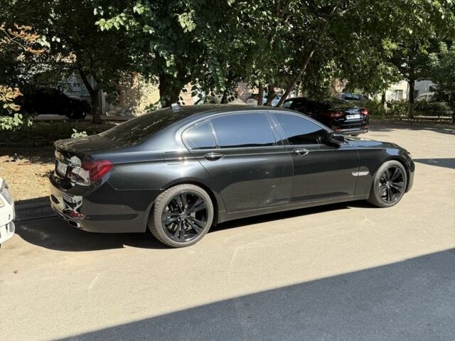 Черный БМВ 7 Серия, объемом двигателя 4.4 л и пробегом 200 тыс. км за 9600 $, фото 1 на Automoto.ua