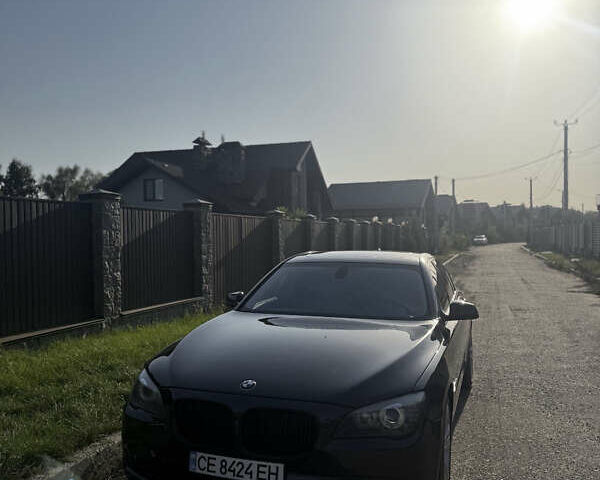 Черный БМВ 7 Серия, объемом двигателя 2.99 л и пробегом 390 тыс. км за 14000 $, фото 1 на Automoto.ua