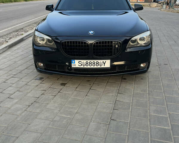 Черный БМВ 7 Серия, объемом двигателя 4.4 л и пробегом 300 тыс. км за 10500 $, фото 1 на Automoto.ua