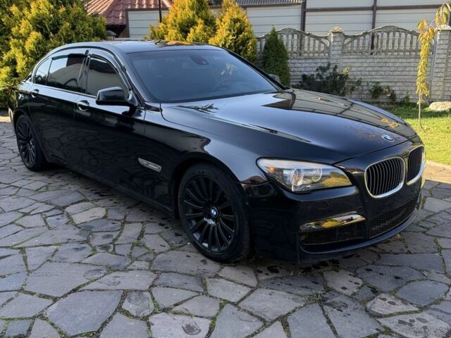 Черный БМВ 7 Серия, объемом двигателя 4.4 л и пробегом 300 тыс. км за 9990 $, фото 1 на Automoto.ua