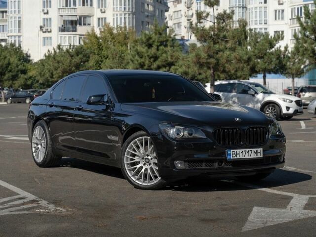 Черный БМВ 7 Серия, объемом двигателя 3 л и пробегом 300 тыс. км за 430 $, фото 1 на Automoto.ua