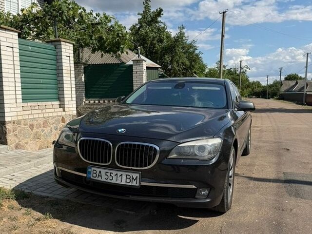 Черный БМВ 7 Серия, объемом двигателя 3 л и пробегом 445 тыс. км за 13999 $, фото 1 на Automoto.ua