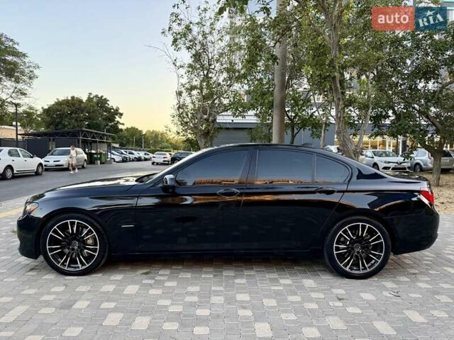 Черный БМВ 7 Серия, объемом двигателя 2.98 л и пробегом 293 тыс. км за 12400 $, фото 1 на Automoto.ua