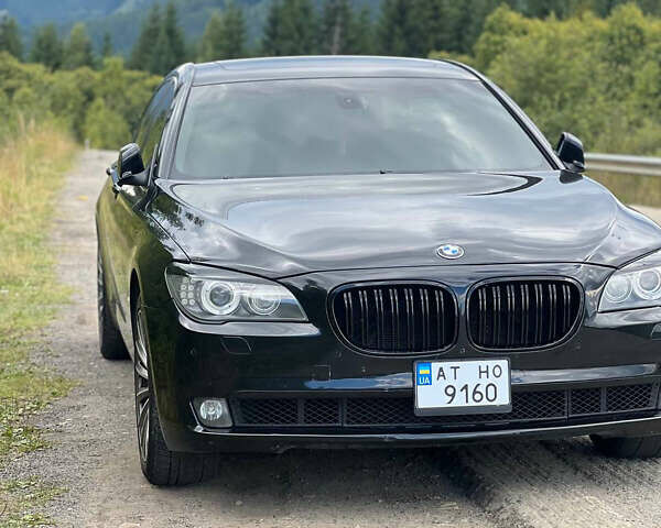 Чорний БМВ 7 Серія, об'ємом двигуна 3 л та пробігом 283 тис. км за 12000 $, фото 1 на Automoto.ua
