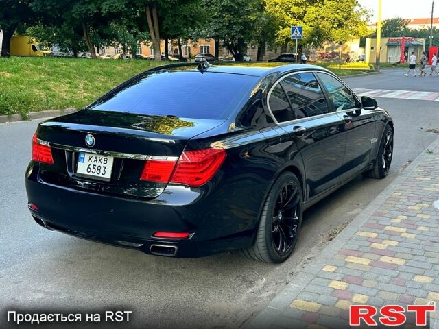 Чорний БМВ 7 Серія, об'ємом двигуна 4.4 л та пробігом 177 тис. км за 16500 $, фото 1 на Automoto.ua