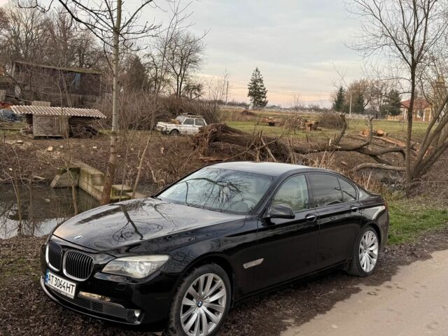 Чорний БМВ 7 Серія, об'ємом двигуна 3 л та пробігом 180 тис. км за 13500 $, фото 1 на Automoto.ua