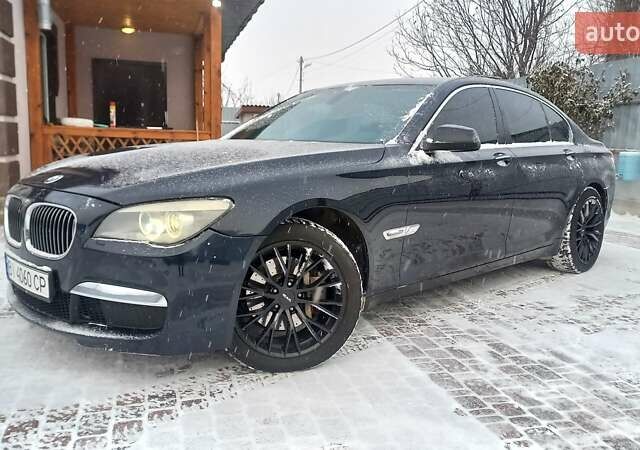 Чорний БМВ 7 Серія, об'ємом двигуна 3 л та пробігом 198 тис. км за 10300 $, фото 1 на Automoto.ua