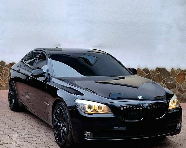Черный БМВ 7 Серия, объемом двигателя 2.99 л и пробегом 270 тыс. км за 16000 $, фото 1 на Automoto.ua