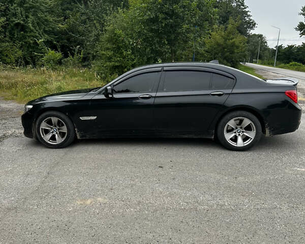 Черный БМВ 7 Серия, объемом двигателя 3 л и пробегом 260 тыс. км за 16500 $, фото 1 на Automoto.ua