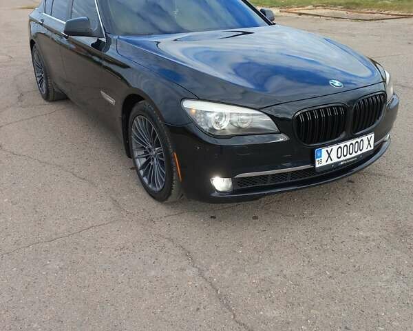 Черный БМВ 7 Серия, объемом двигателя 3 л и пробегом 368 тыс. км за 15000 $, фото 1 на Automoto.ua