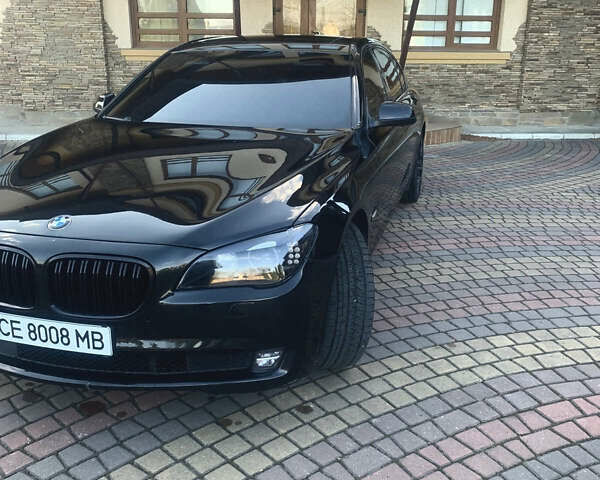 Чорний БМВ 7 Серія, об'ємом двигуна 2.98 л та пробігом 185 тис. км за 16000 $, фото 1 на Automoto.ua