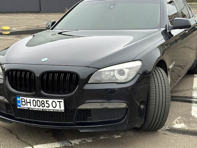 Чорний БМВ 7 Серія, об'ємом двигуна 3 л та пробігом 200 тис. км за 12400 $, фото 1 на Automoto.ua