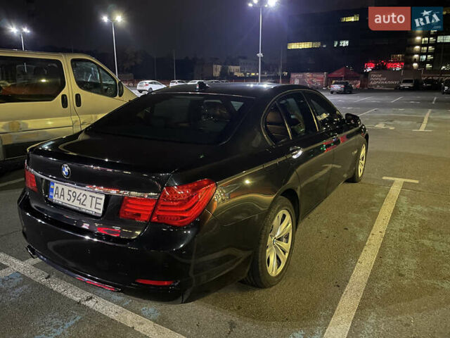 Черный БМВ 7 Серия, объемом двигателя 2.99 л и пробегом 290 тыс. км за 19000 $, фото 1 на Automoto.ua